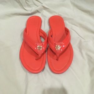 Tory Burch orange flip flops